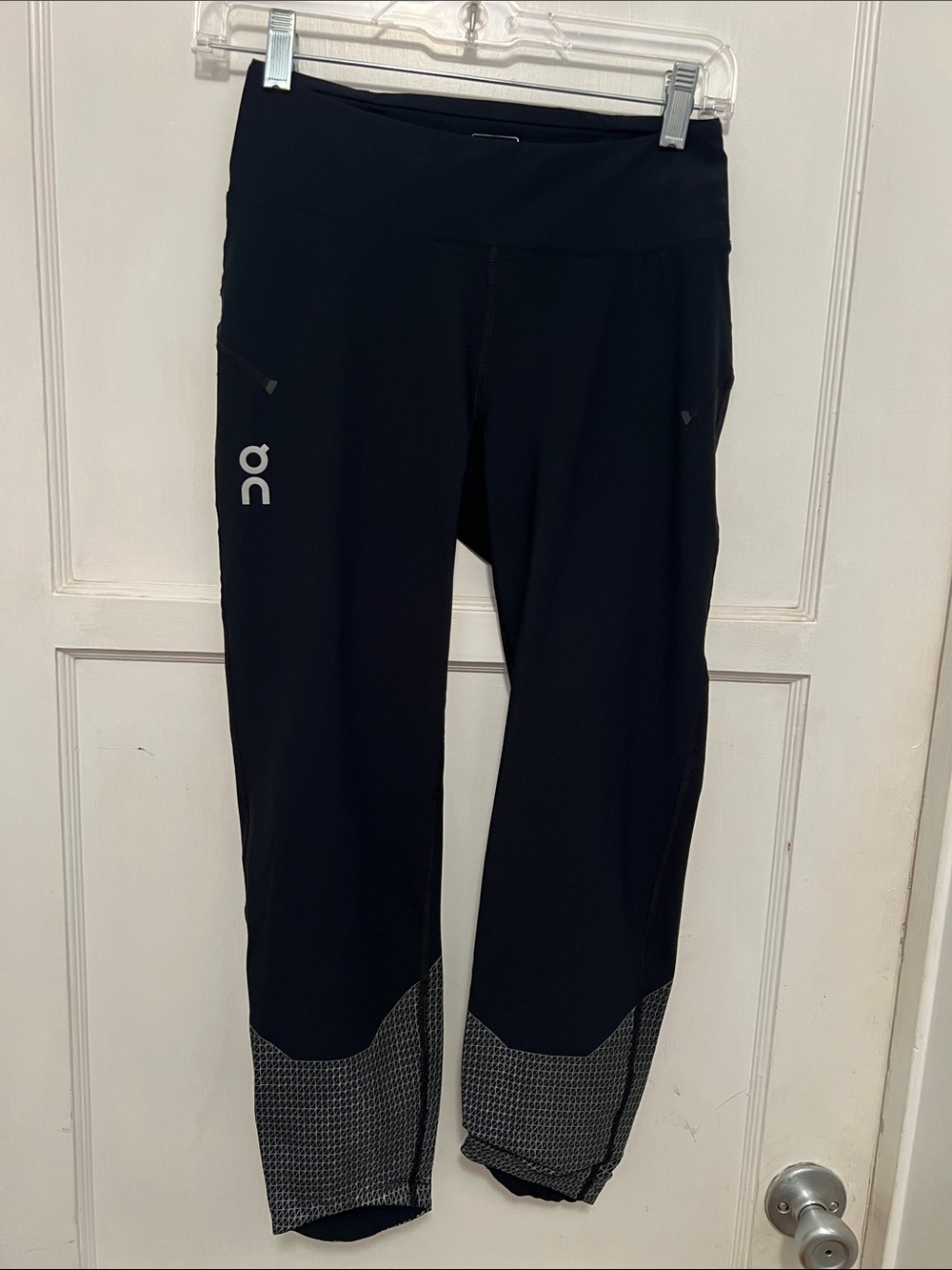 On Running Black Leggings with Reflective Logo
